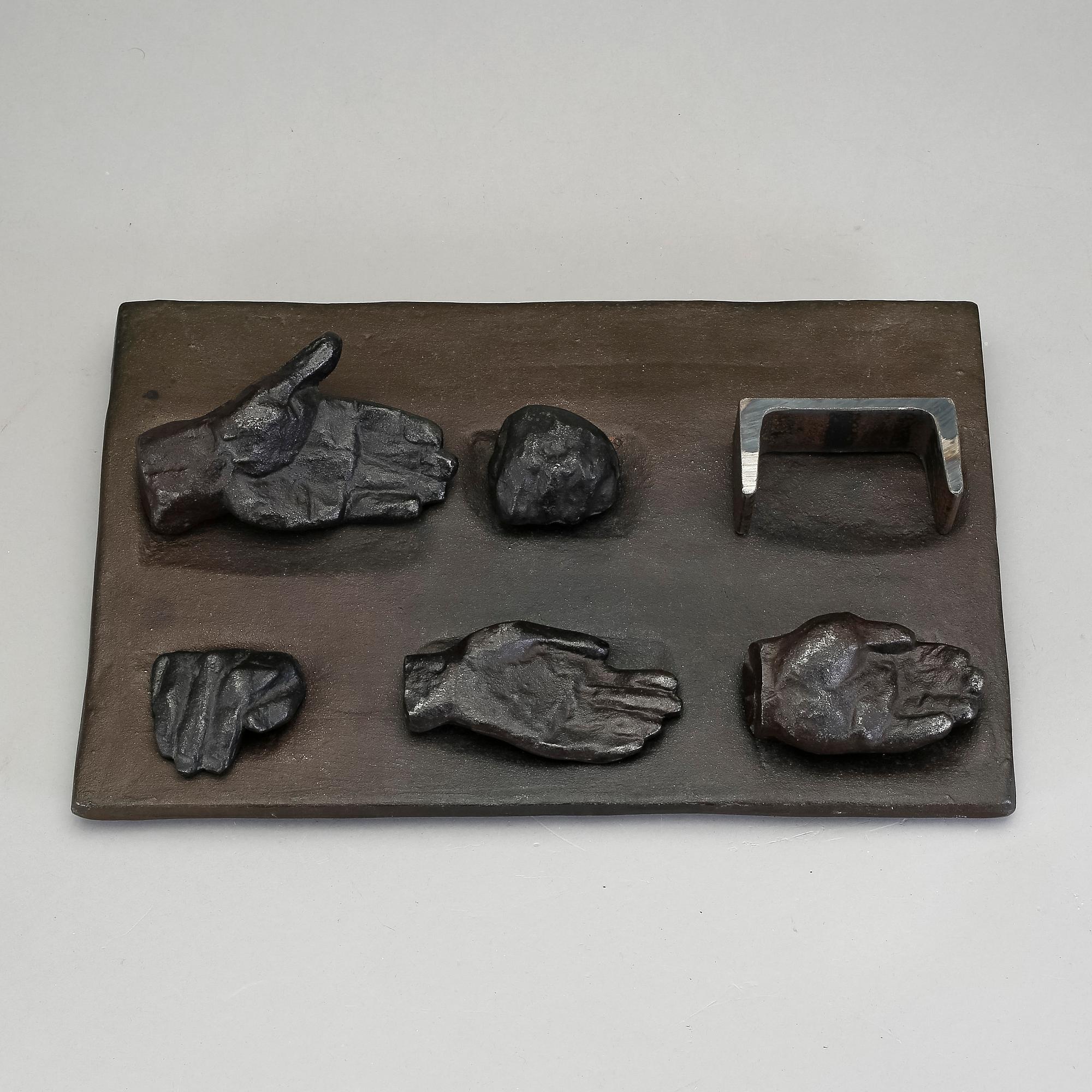 TORSTEN RENQVIST, gjutjärn i 7 delar. Signerad T.R och daterad -69 och numrerad 8/30.