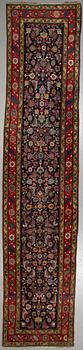 A RUNNER, semi-antique Karabagh, ca 500 x 106 cm.