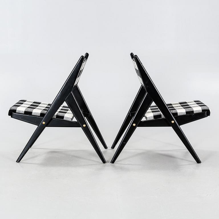 A pair of mid 20th century chairs.