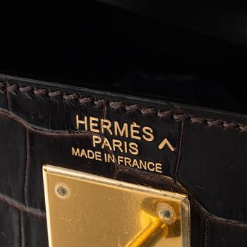 Hermès, a Crocodile Porosus 'Kelly 32' handbag, 2009.