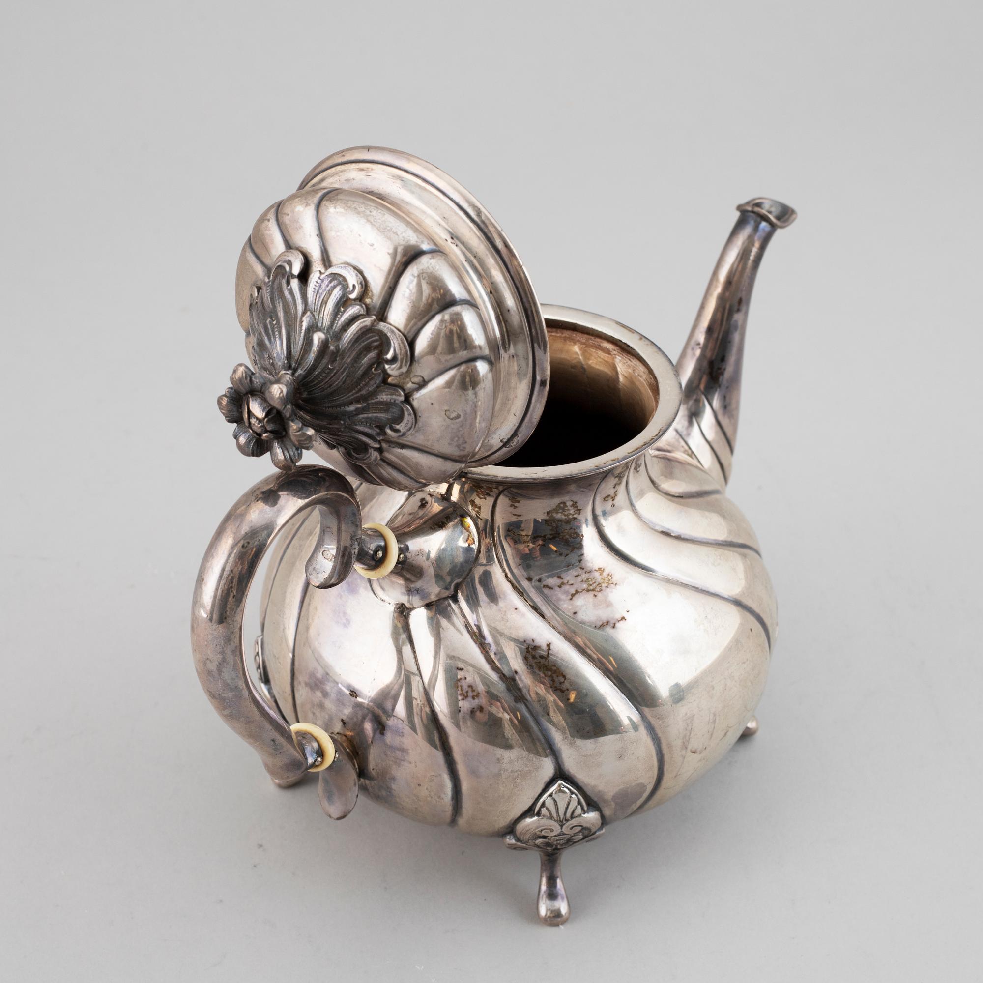 A Danish Rococo style silver teapot, P. Hertz, Copenhagen, Denmark, 1936.