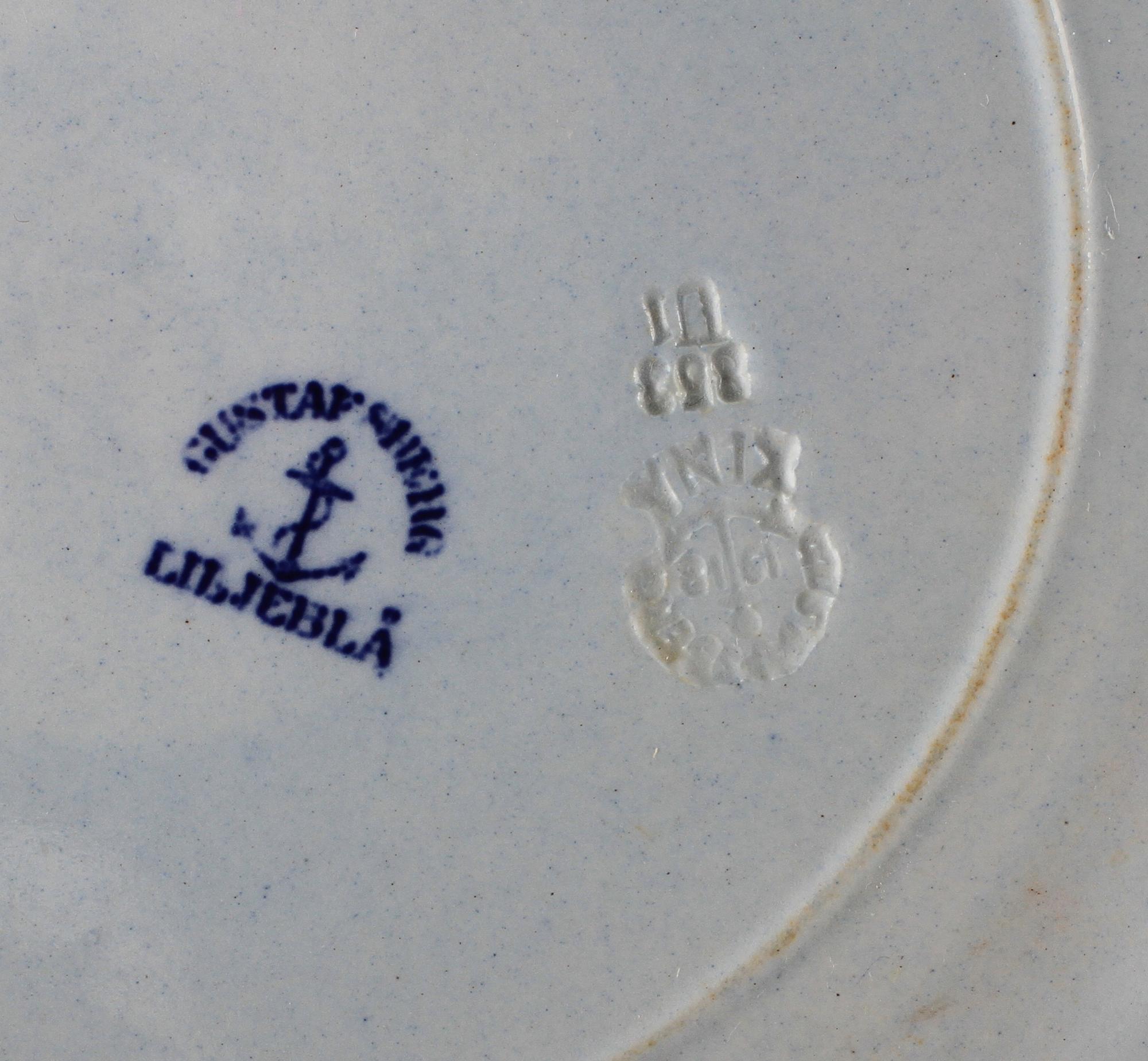 MATSERVISDELAR, 24 st, flintgods, "Liljeblå", Wilhelm Kåge, Gustavsberg.