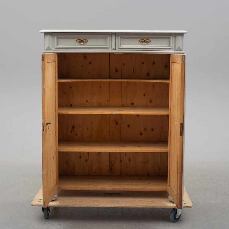 a cabinet from around 1900.