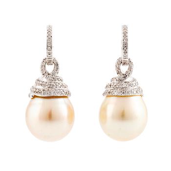 535. A pair of 18K white gold cultured South Sea pearl earrings.
