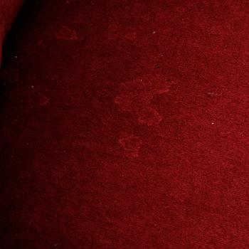 A first half of the 20th Century sofa with velvet upholstery.