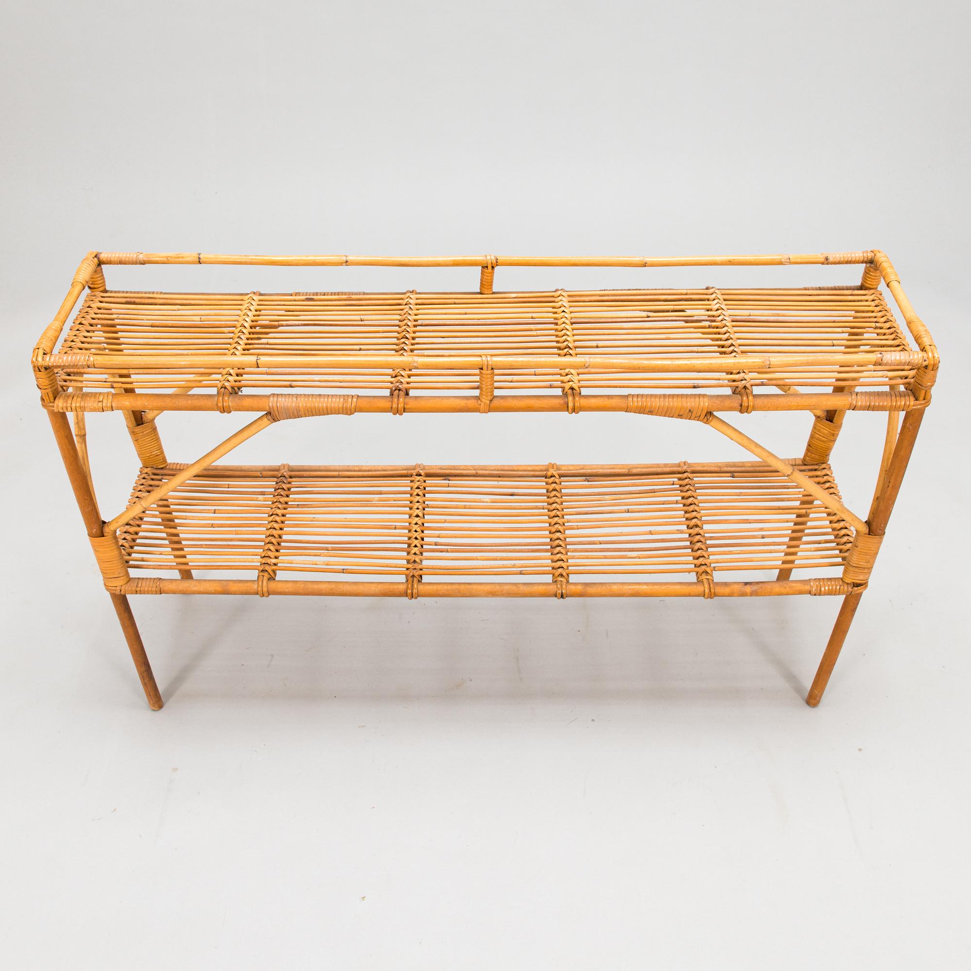 A mid 20th century rattan flower table.