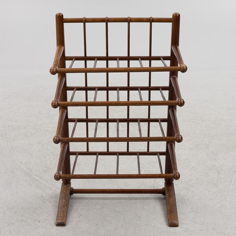 A magazine rack, mid-20th century.