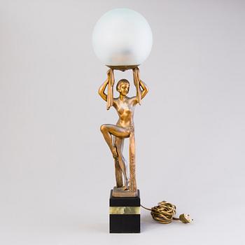 An Art Déco table lamp, marked Limousin, Paris.