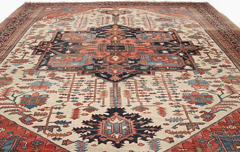 An antique Heriz Serapi carpet, West Persia, c. 616 x 407 cm.