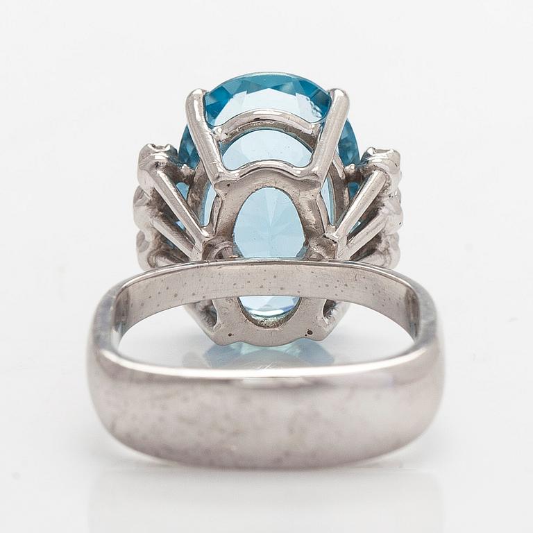 An 18K white gold ring with aquamarine and brilliant-cut diamonds, Conti, South Africa.