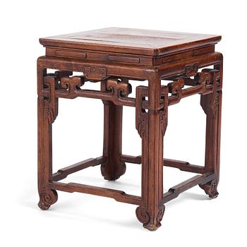 1046. A Chinese hardwood table/seat, Qing dynasty, 19th Century.