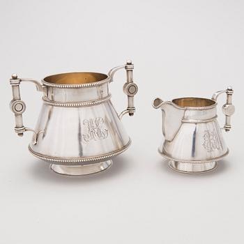 A similar silver sugar bowl and milk jug by Stefan Wäkevä, St.Petersburg 1891 and 1892.