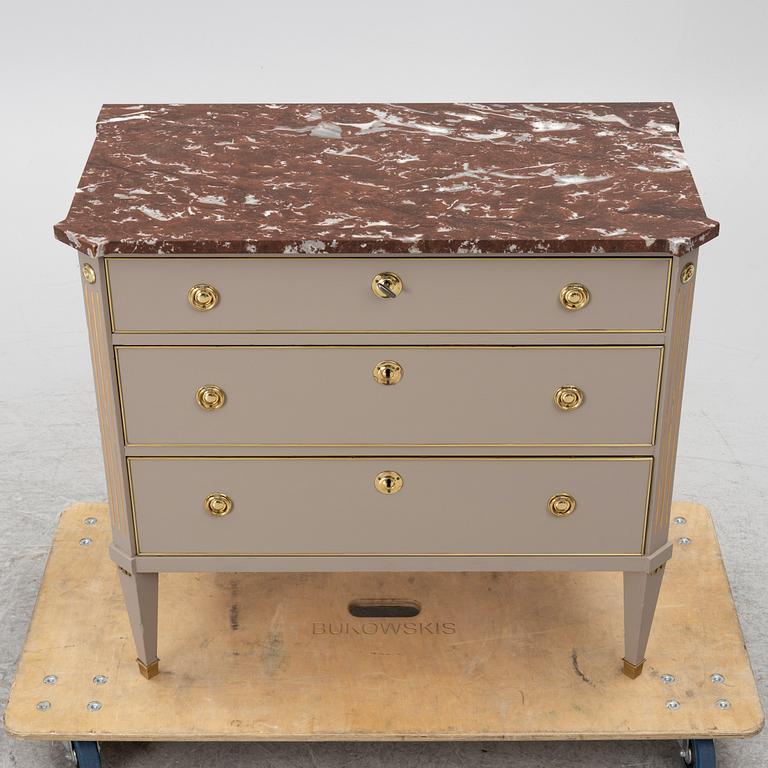 A Gustavian style chest of drawers, Mid 20th Century.