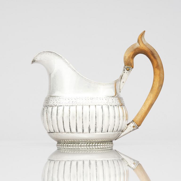 A 19th Century parcel-gilt silver cream-jug, mark of Johan Enock Franck.