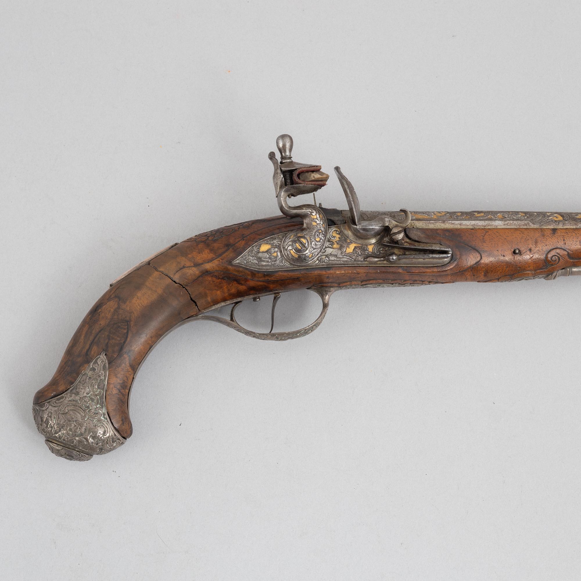 A Pair of flintlock pistols, by Johann Jacob Kuchenreuter, (Regensburg 1709-1783, Royal gunsmith).