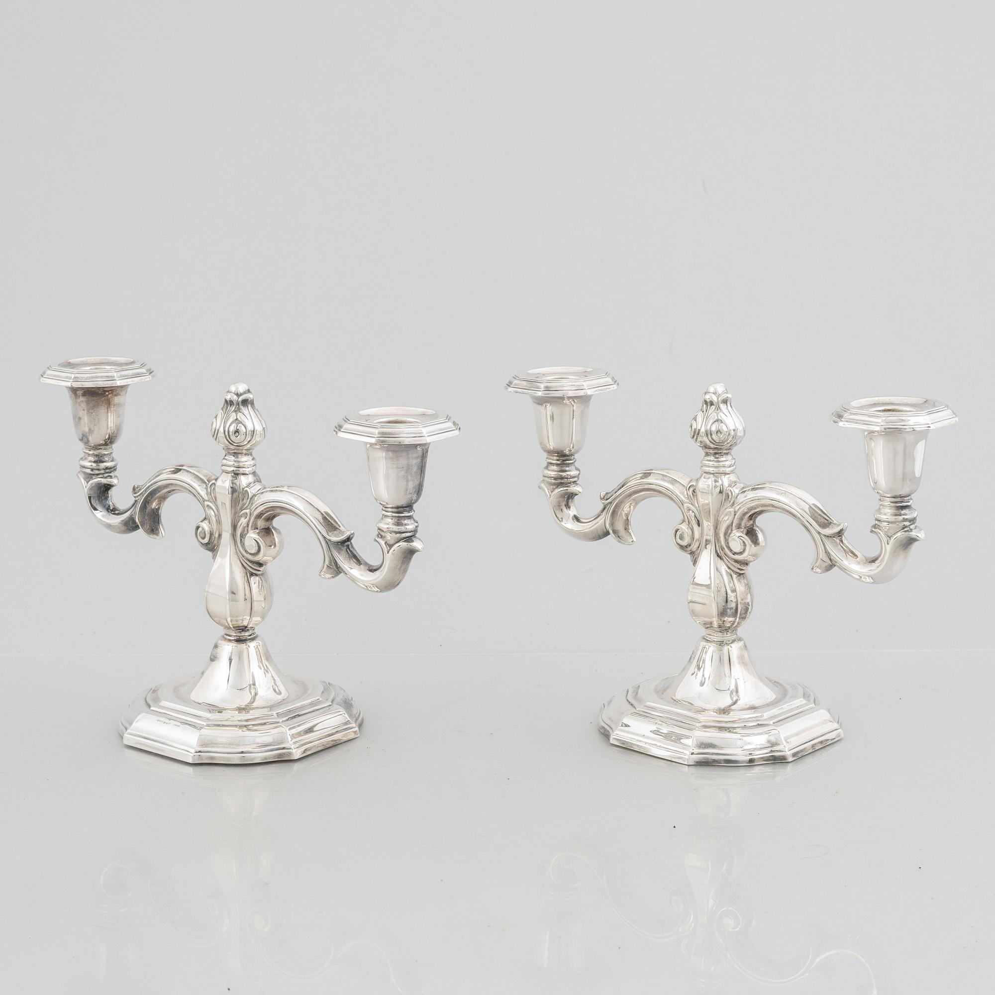 A pair of Swedish silver candelabras, marks of CG Hallberg, Stockholm 1959.