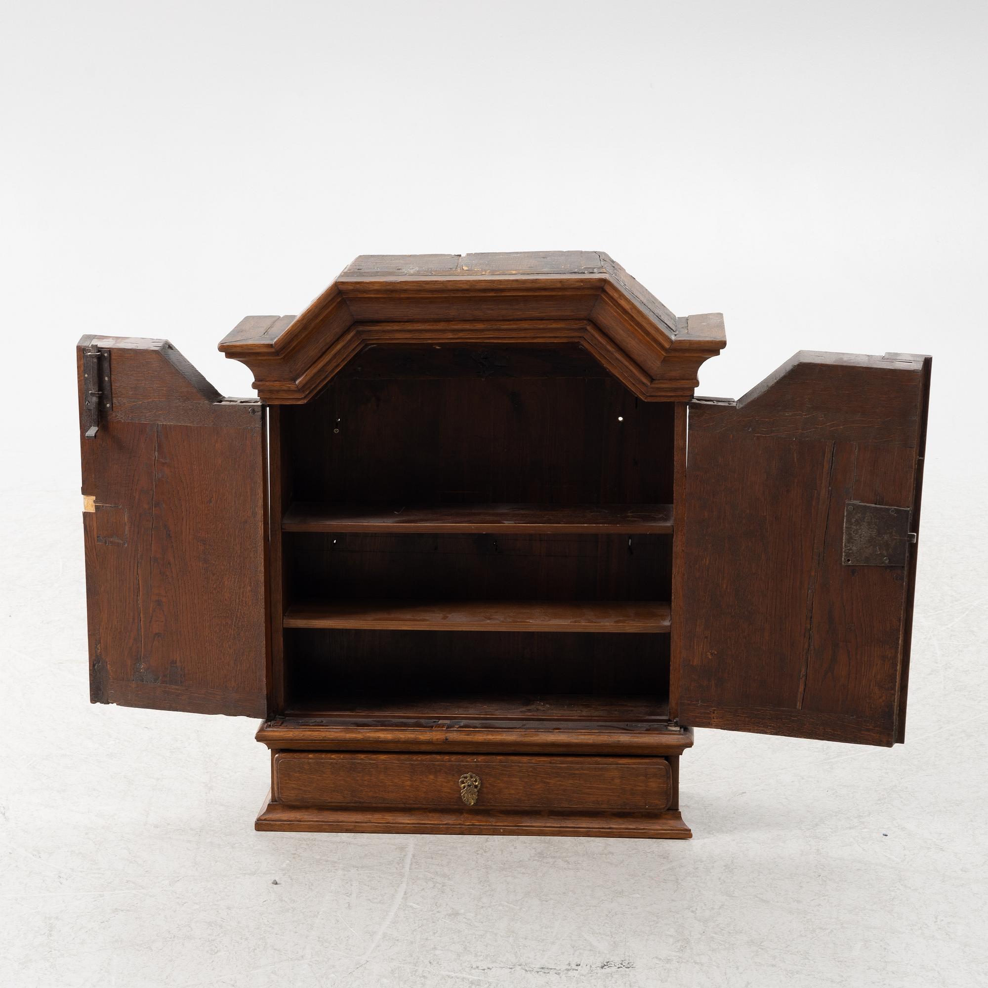 A wall cabinet, 18th century.