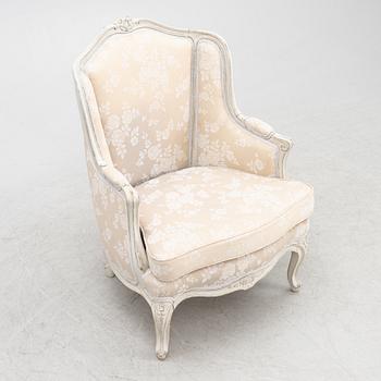 Armchair, bergère model, Rococo style, circa 1900.