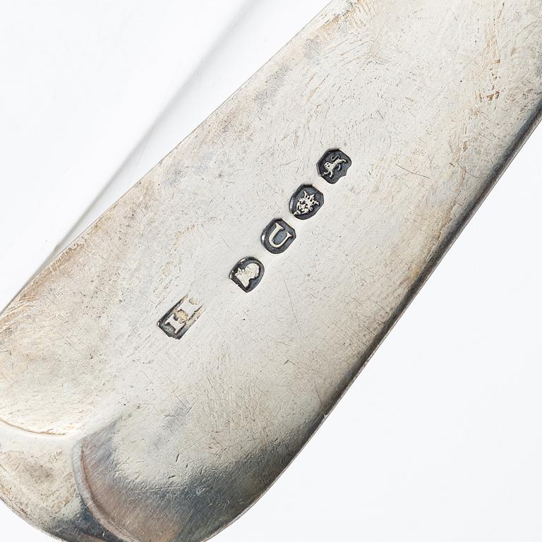 An English silver serving spoon, London 1815.