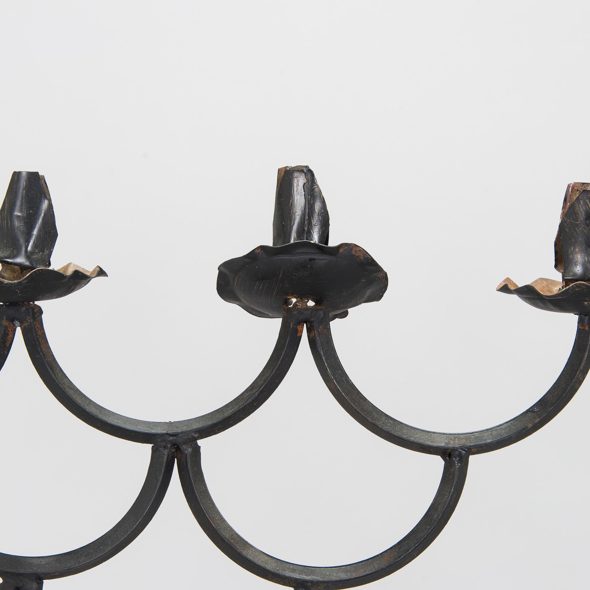 A pair of floor candelabras, made to order from the 1920s.