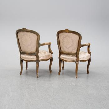A pair of Louis XV-style arm chairs, 20th century.