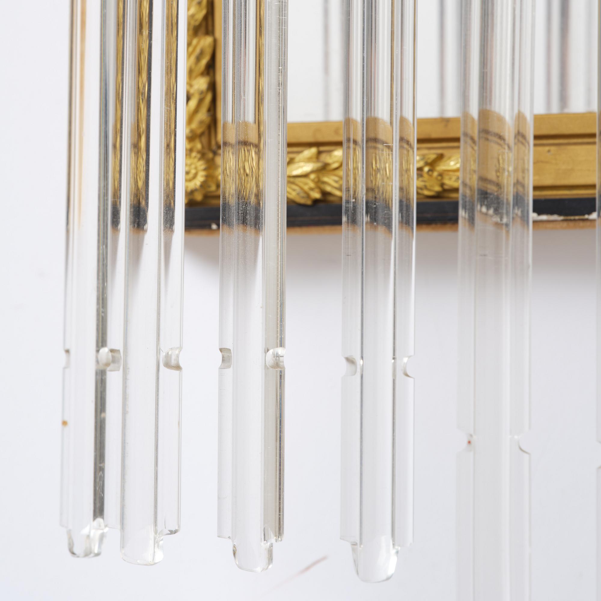 A pair of mirror sconces, 1910's/20's.