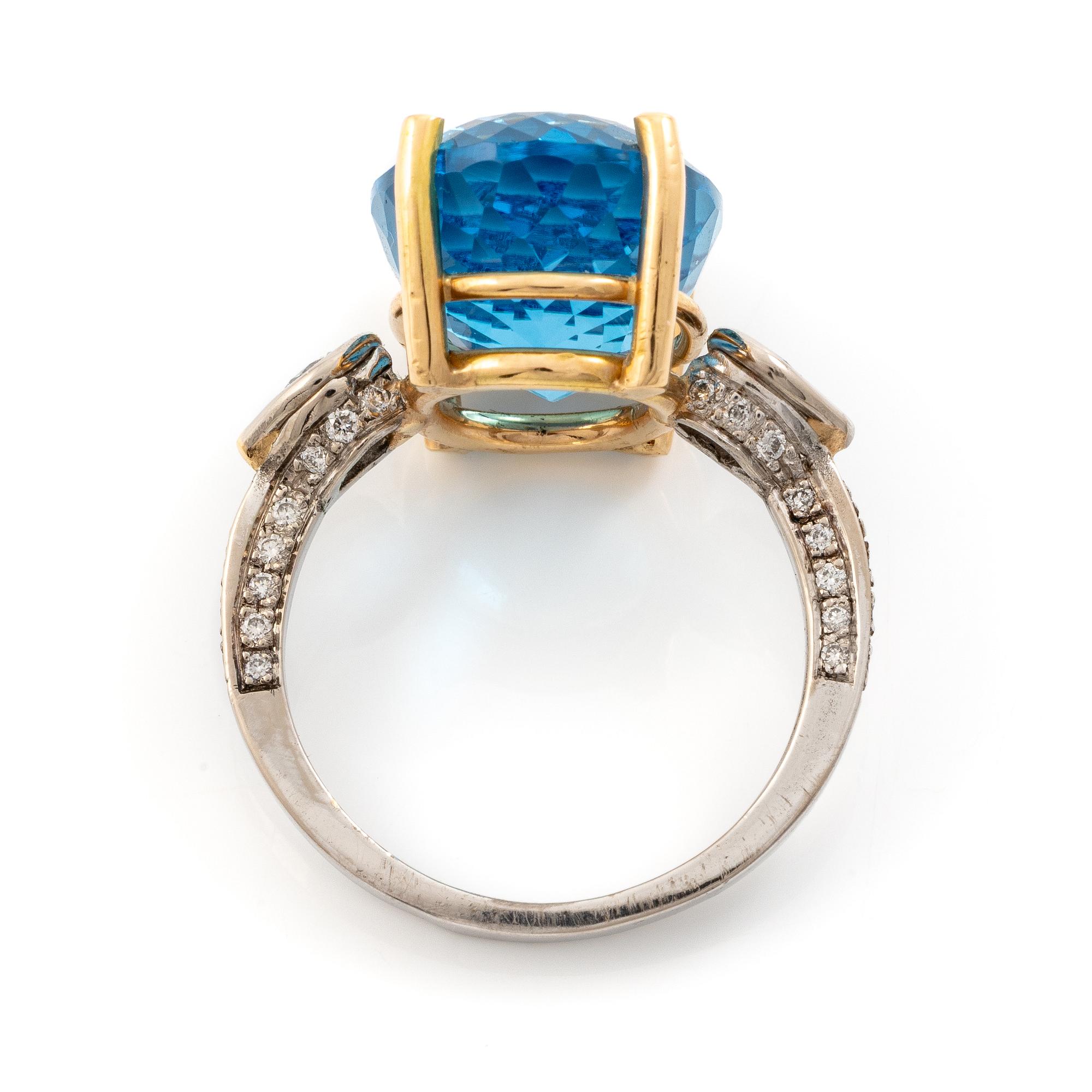Ring, Mandelstam, 18K gold and white gold with blue topaz and brilliant-cut diamonds.