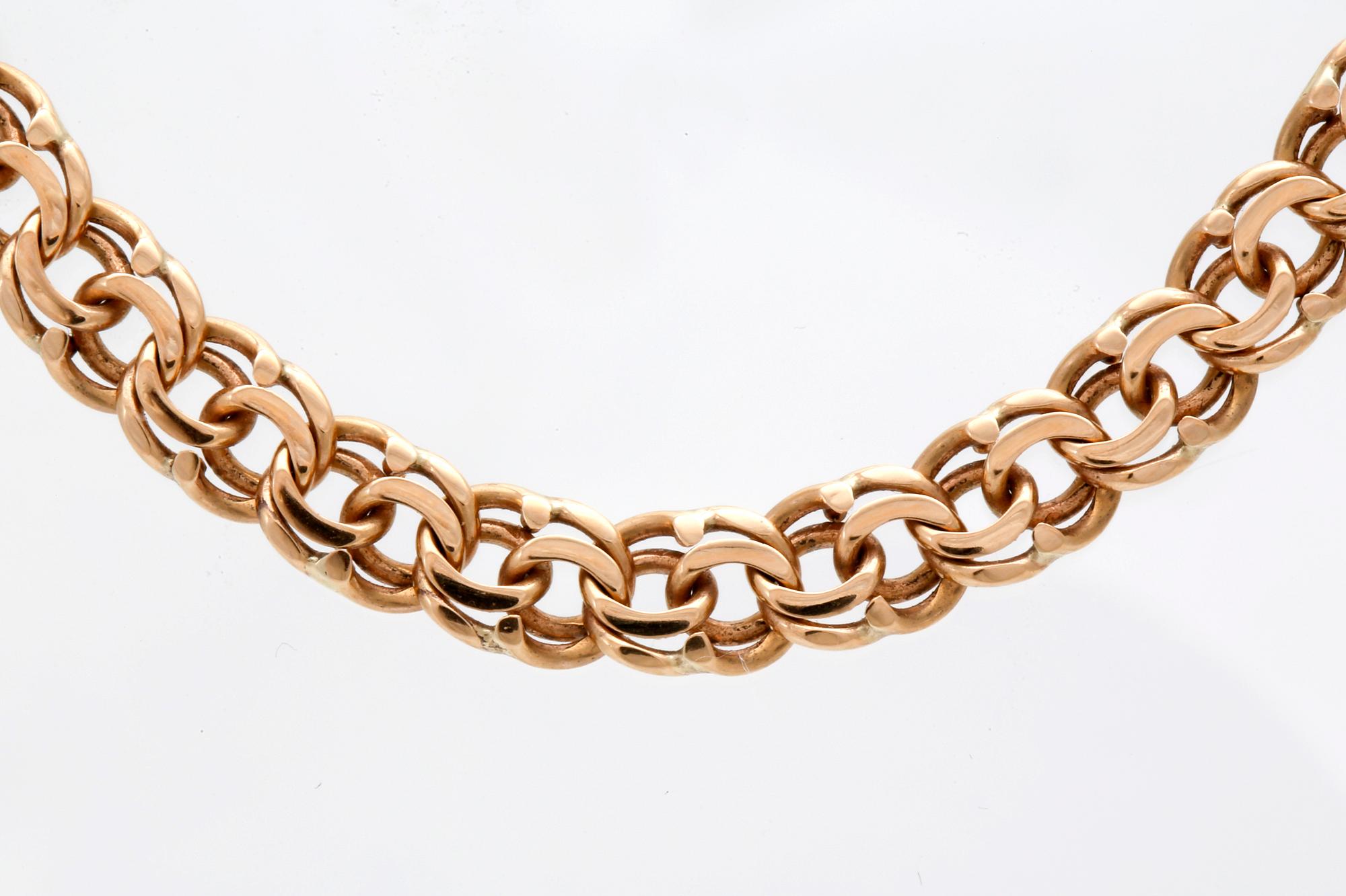 An 18K gold chain. 38g.