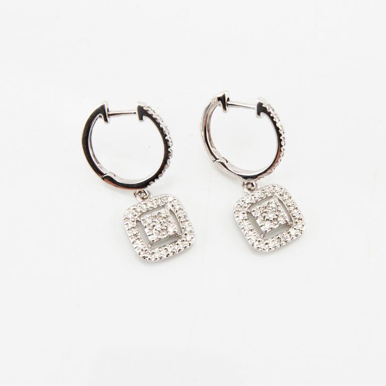 Earrings in 18K white gold with round brilliant-cut diamonds.