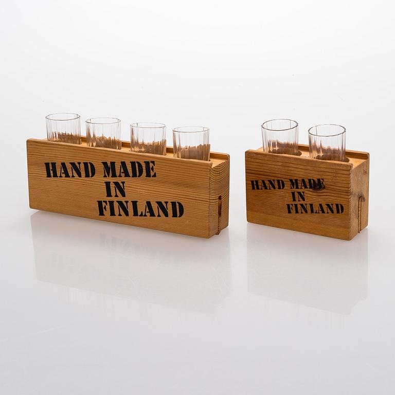 Heikki Orvola, two sets of 70s 'Spektro' schnapps glasses for Arabia, in wood boxes, four and two in each.
