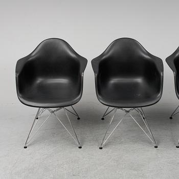 CHARLES AND RAY EAMES,  4  Eames Plastic Armchair, Vitra 2010.