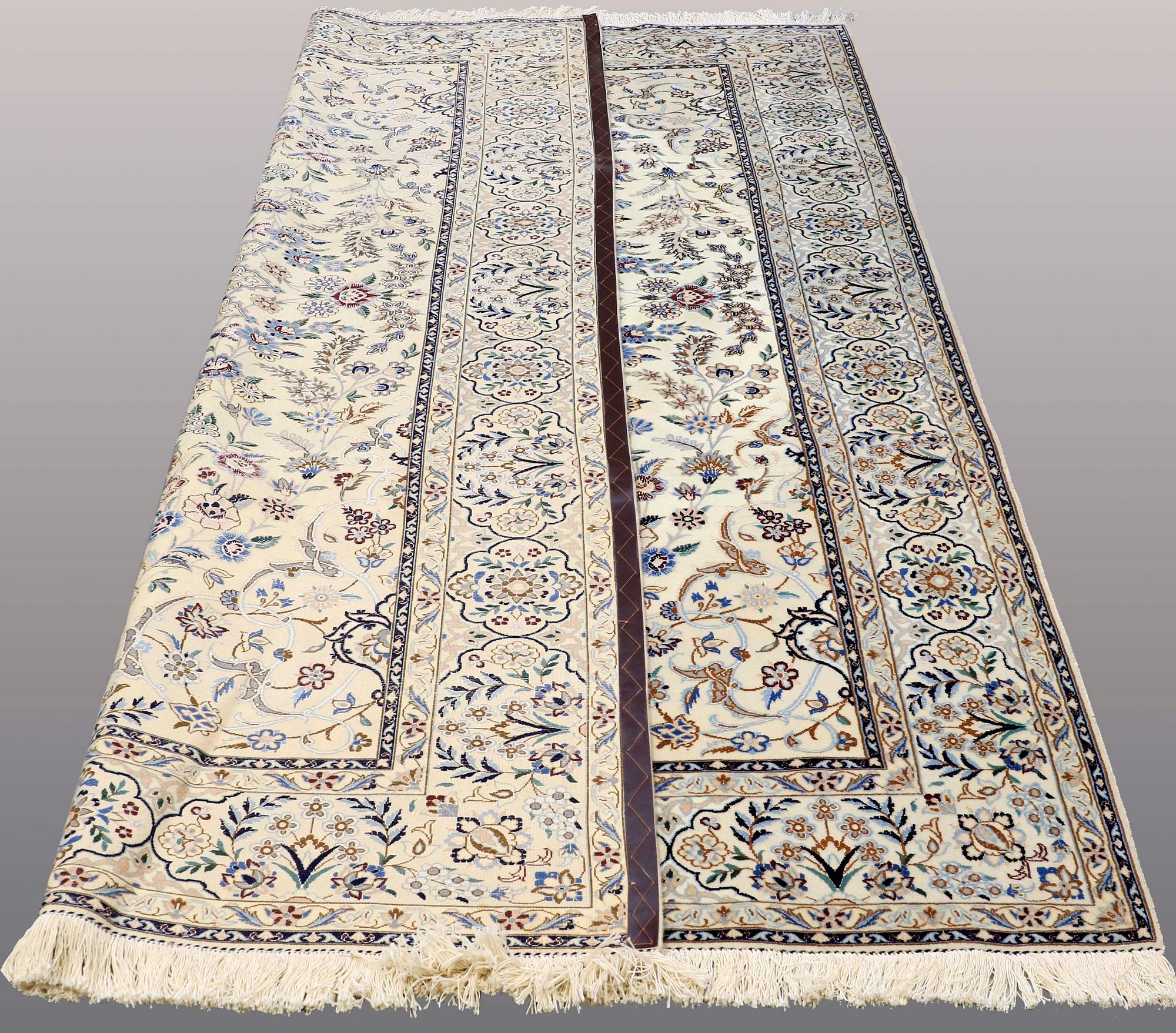 A CARPET, Nain part silk, so called 9 LAA, ca 307 x 210 cm.