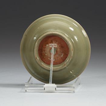 A small celadon glazed dish, Ming dynasty (1368-1644).