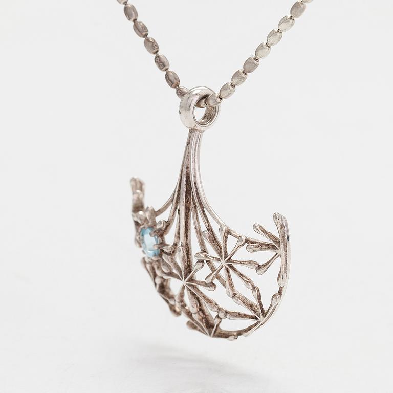 A sterling silver necklace and topaz, 'The Woman's Voice' by Kirsti Doukas, Kalevala Koru, designed in 2006.