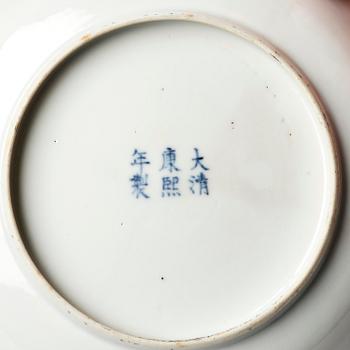 A set of four famille rose floral dishes, Qing dynasty with a apocryphal six character mark.