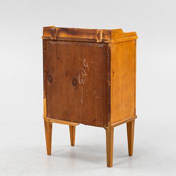 A Gustavian style bedside table, circa 1900.