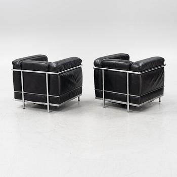 Le Corbusier, Pierre Jeanneret & Charlotte Perriand, a pair of 'LC2' easy chairs, Cassina.