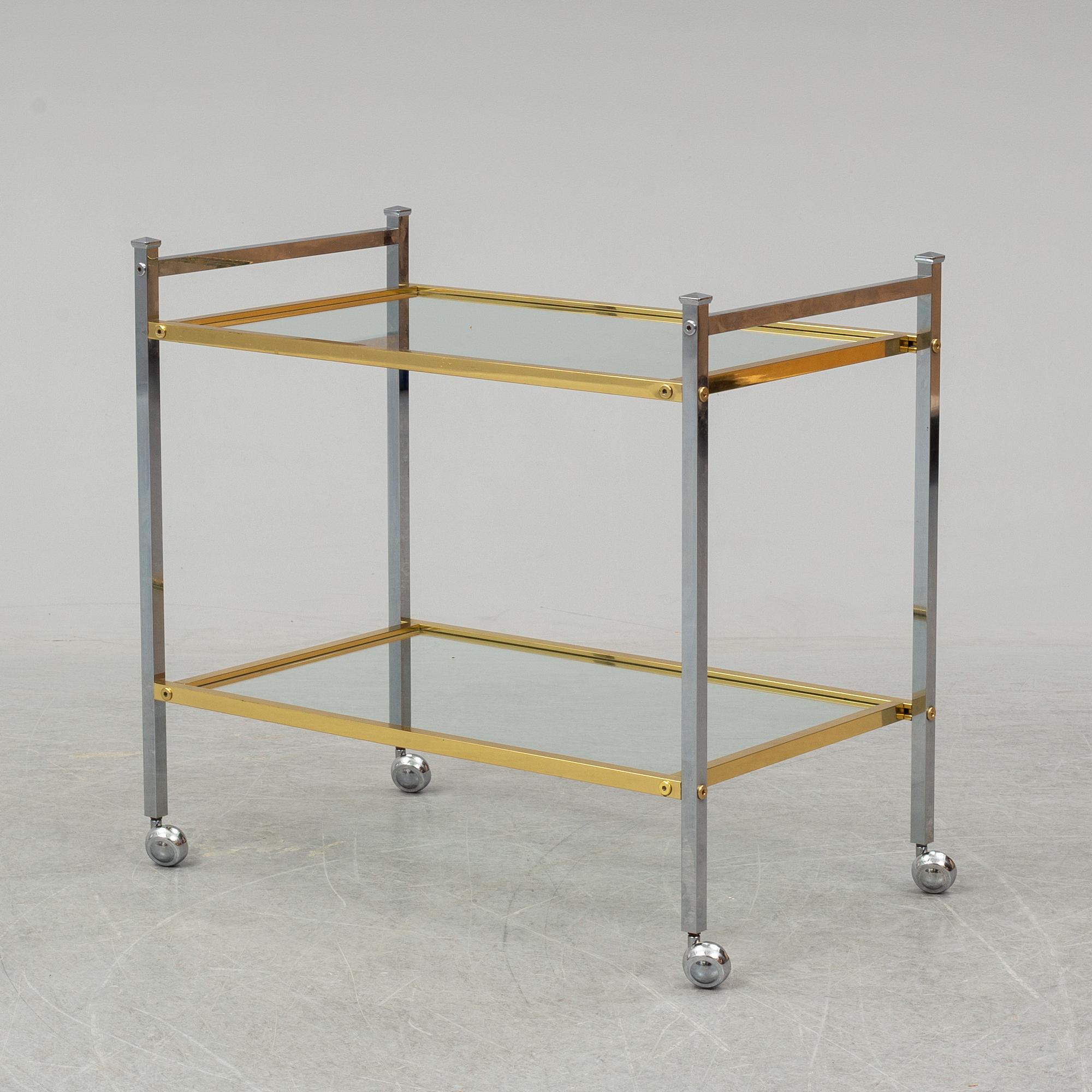 A metal and glass drinks trolley, 1970's/80's.