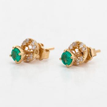 A pair of earrings and a chain ca 18K gold, and a pendant ca 14K gold with emeralds and diamonds ca 0.24 ct in total.