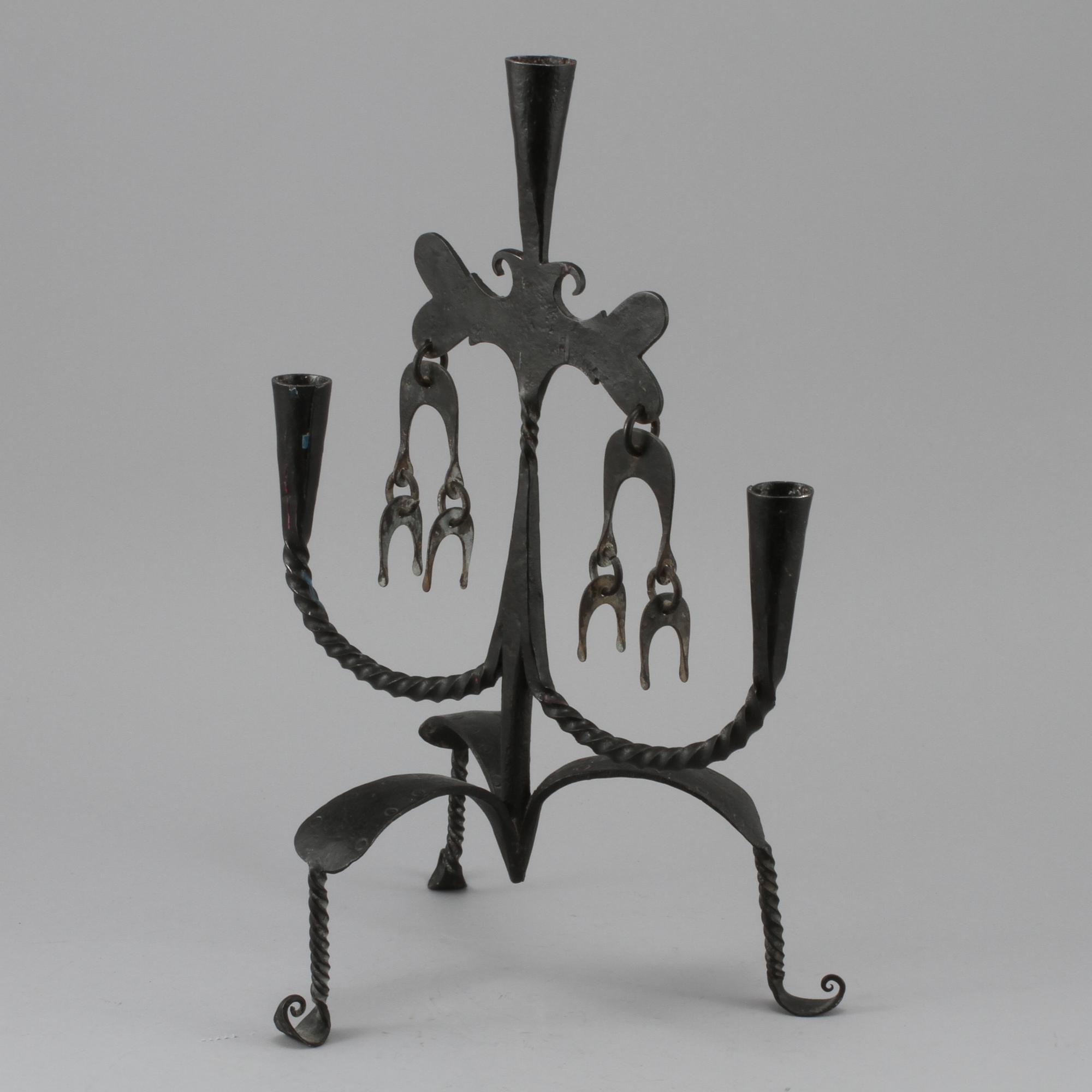 LJUSSTAKE, smide, 1900-tal.