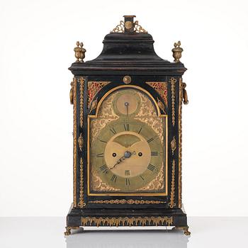 An ebonised George III striking bracket clock with pull repeat marked 'John Taylor London', late 18th century.