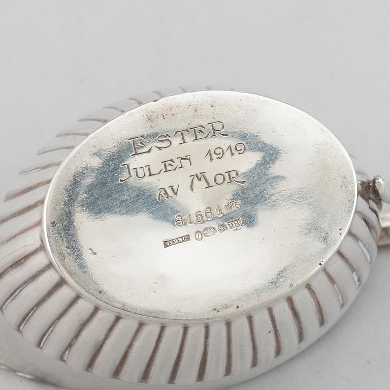 A silver mocha pot, creamer and sugar bowl, swedish import mark of NL Dahlström & Co, Örebro 1930.
