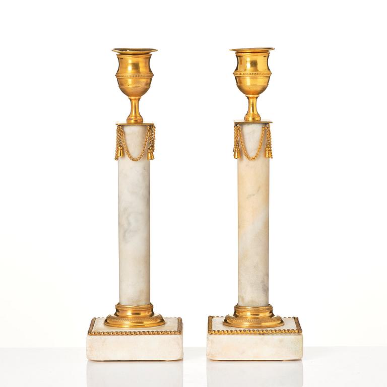 A pair of late Gustavian candlesticks.