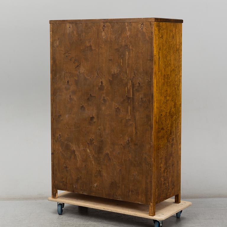 A birch venereed cabinet, 1930's.