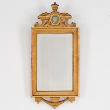 An early 20th century gustavian style mirror.