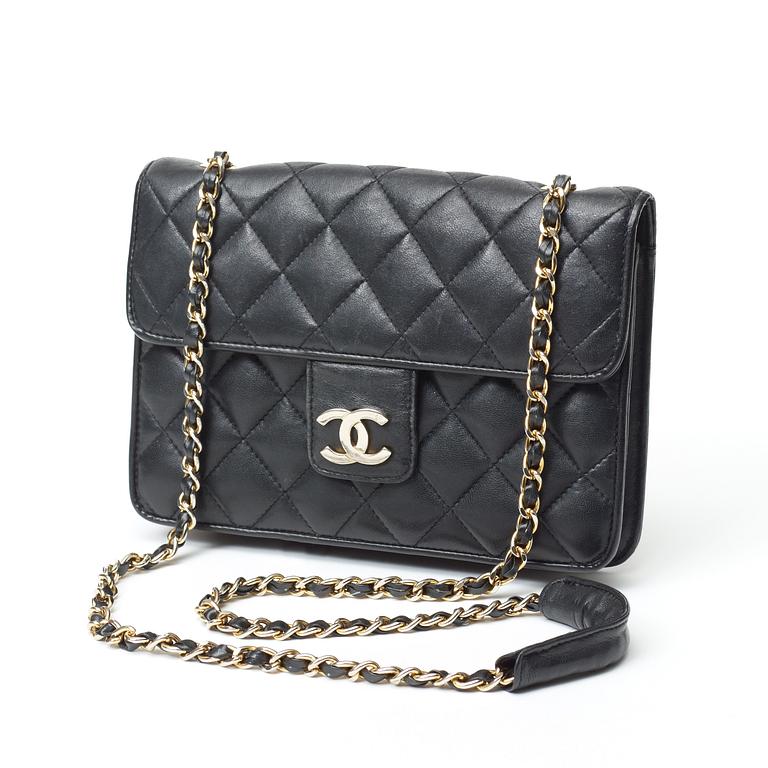 A 1970s black quilt leather shoulder bag by Chanel.