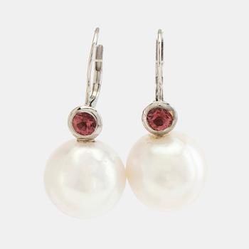 Earrings, a pair of 18K white gold set with faceted pink tourmalines and cultured South Sea pearls.