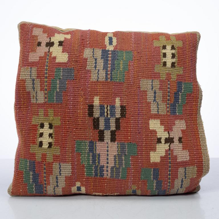 Märta Måås-Fjetterström, a cushion, 'Blommor på röd botten', signed AB MMF, ca. 31 x 31 cm.