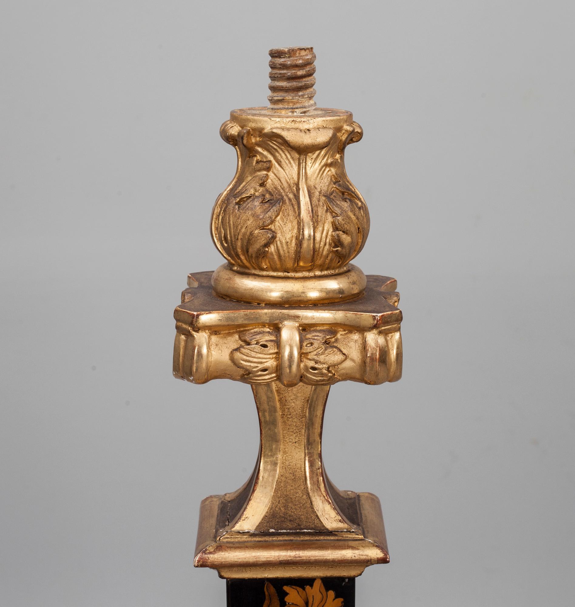 A pair of French Baroque circa 1700 candle stands.