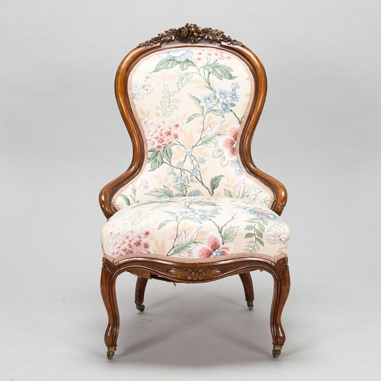 A late 19th century armchair in Rococo style.